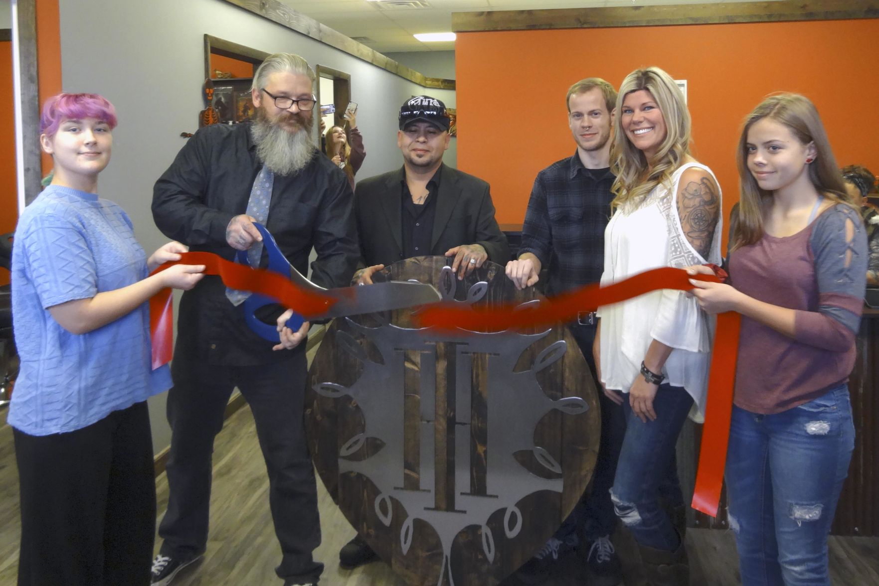 Tattoo parlor celebrates grand opening